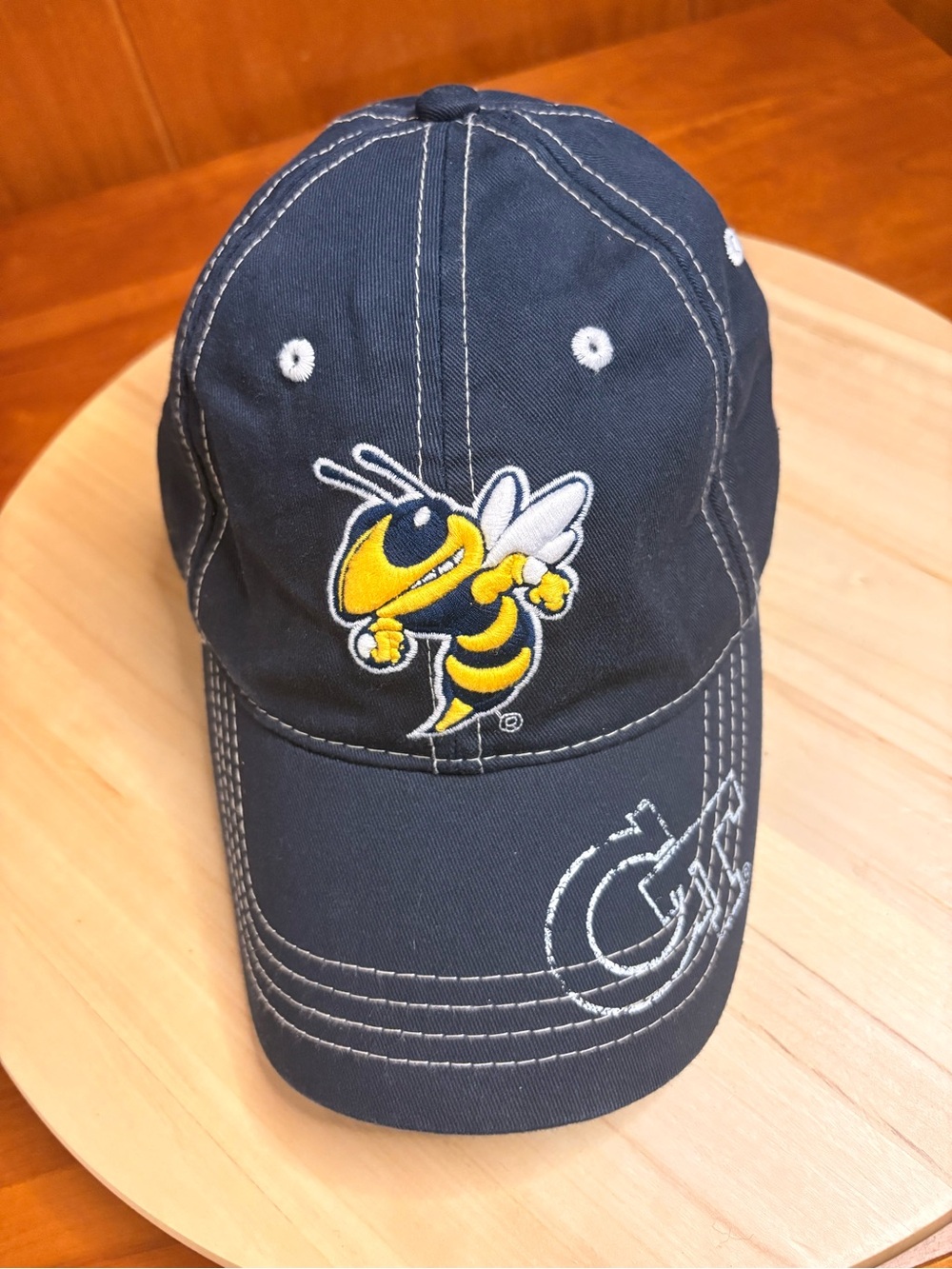 navy blue Georgia Tech baseball cap features an embroidered Buzz mascot